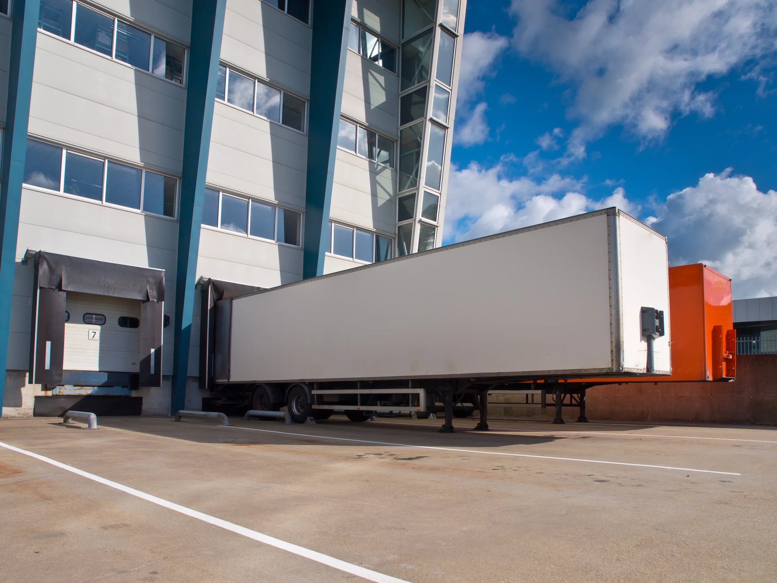 Dry freight truck loading at distribution center dock